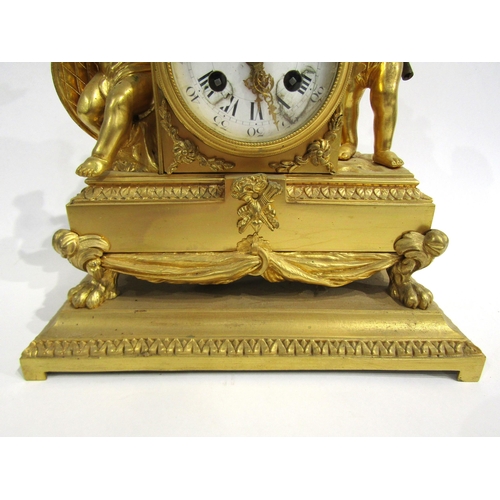 8060 - A 19th Century French ormolu/gilt metal mantel clock, the white enamel Roman numeral dial with outer... 