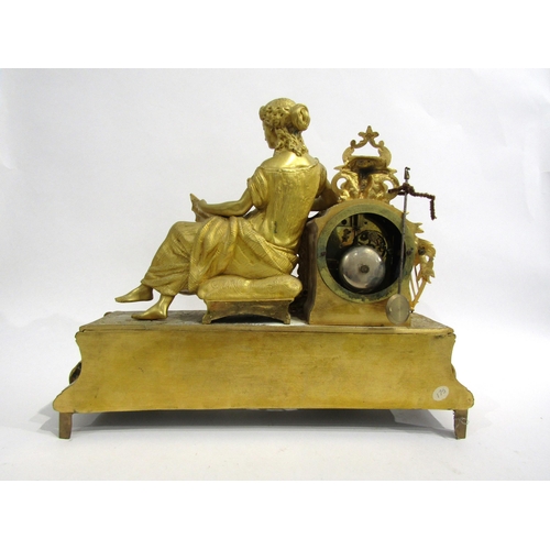 8062 - A French gilt metal mantel clock, leaf decorated base with porcelain floral design panels, surmounte... 