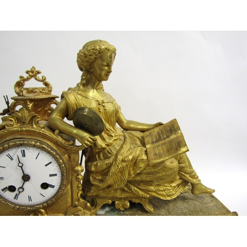 8062 - A French gilt metal mantel clock, leaf decorated base with porcelain floral design panels, surmounte... 