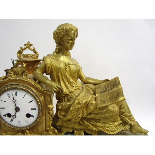 8062 - A French gilt metal mantel clock, leaf decorated base with porcelain floral design panels, surmounte... 