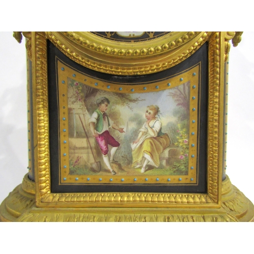 8051 - A 19th Century French gilt metal mantel clock, various waterside and village scene panels, with cent... 