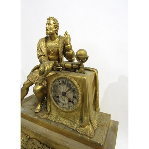 8043 - A large 19th Century gilt metal mantel clock, he ornate scroll design base surmounted by a distingui... 