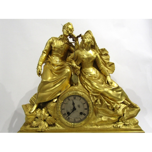 8045 - A large early 19th Century French ormolu/gilt metal mantel clock, the ornately designed floral and s... 