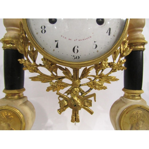 8052 - An early 19th Century French composite marble and gilt metal portico form mantel clock, the white en... 