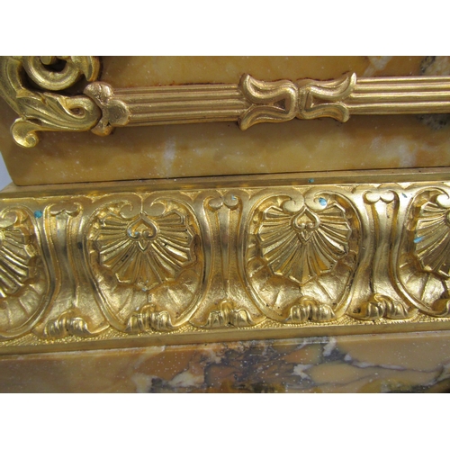 8040 - A large 19th Century ormolu/gilt metal and Siena marble mantel clock, the ornate layered base surmou... 