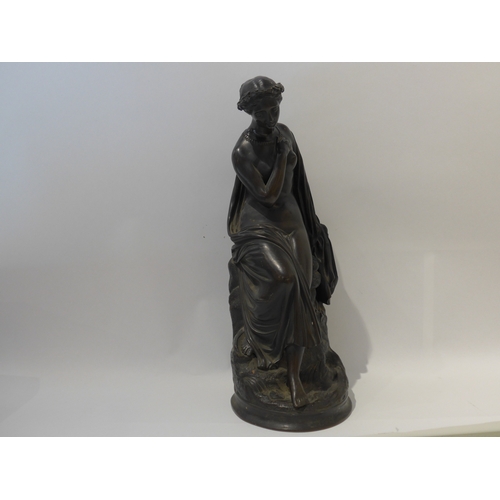 6104 - A bronze sculpture as a semi-clad female, no visible signature, 40.5cm high