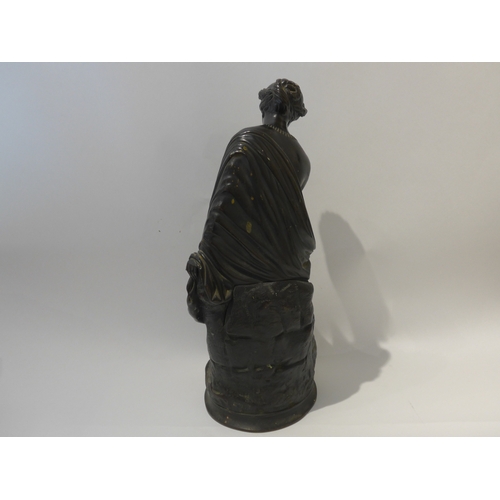 6104 - A bronze sculpture as a semi-clad female, no visible signature, 40.5cm high