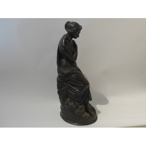 6104 - A bronze sculpture as a semi-clad female, no visible signature, 40.5cm high