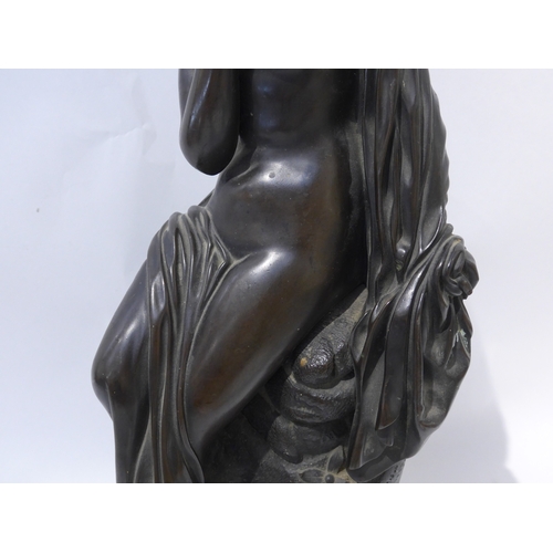 6104 - A bronze sculpture as a semi-clad female, no visible signature, 40.5cm high