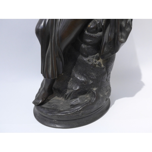 6104 - A bronze sculpture as a semi-clad female, no visible signature, 40.5cm high