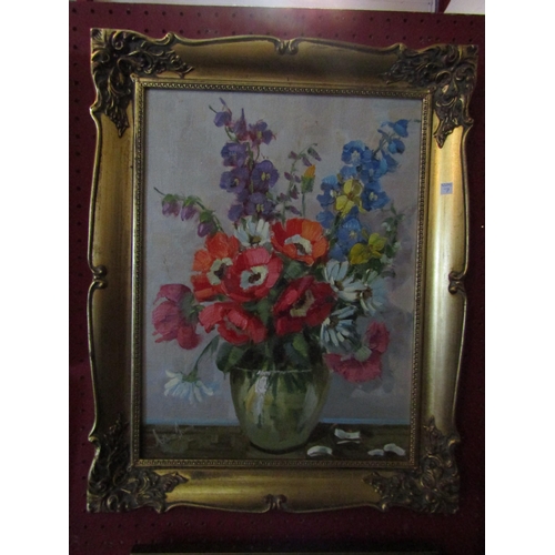 1053 - Two ornate framed oils on canvas, still life floral studies, one by Arthur Jones, one signed Schuman... 