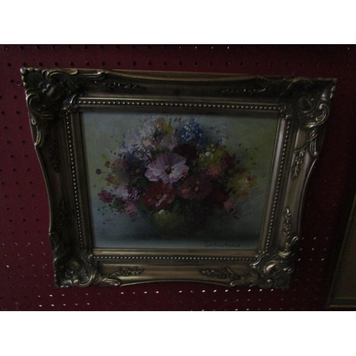 1053 - Two ornate framed oils on canvas, still life floral studies, one by Arthur Jones, one signed Schuman... 