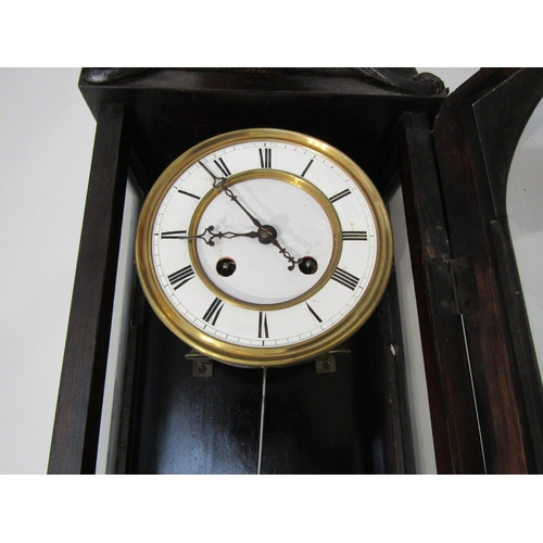 8017 - A ebonised wall hanging clock with white Roman numeral chapter ring, case having been painted black,... 