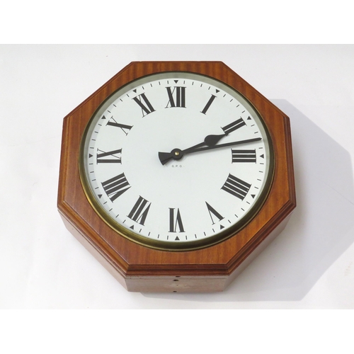 8029 - A contemporary British General Post Office (G.P.O.) double-sided octagonal form dial clock, white Ro... 