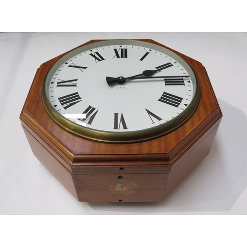 8029 - A contemporary British General Post Office (G.P.O.) double-sided octagonal form dial clock, white Ro... 