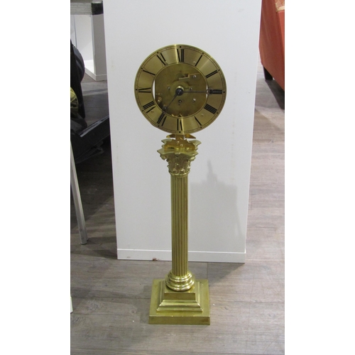 8030 - A brass column form skeleton clock, with Roman numeral chapter ring on a single fusee movement, with... 