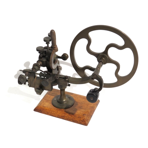 8204 - A watchmaker's topping tool, for adapting the profile of teeth on watch wheels, on wooden base