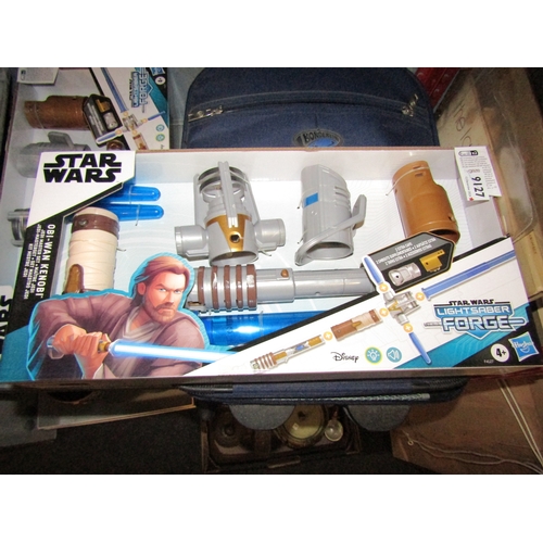 1248 - Four boxed Hasbro Star Wars Obi-Wan Kenobi Jedi Master Lightsaber sets (4)