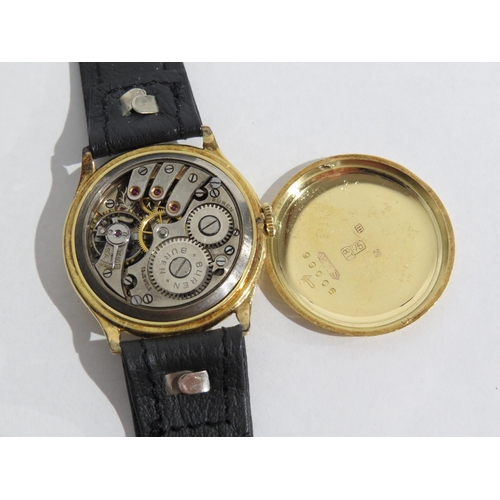 8161 - A Buren 18ct gold cased wristwatch on leather strap, the Arabic numeral dial with moon style hands a... 