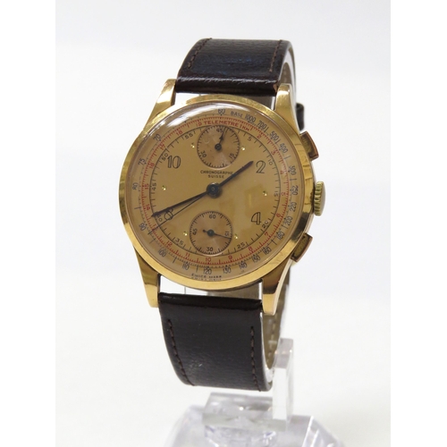 8162 - An 18ct gold cased chronograph wristwatch on leather strap, the gold coloured dial with Arabic numer... 