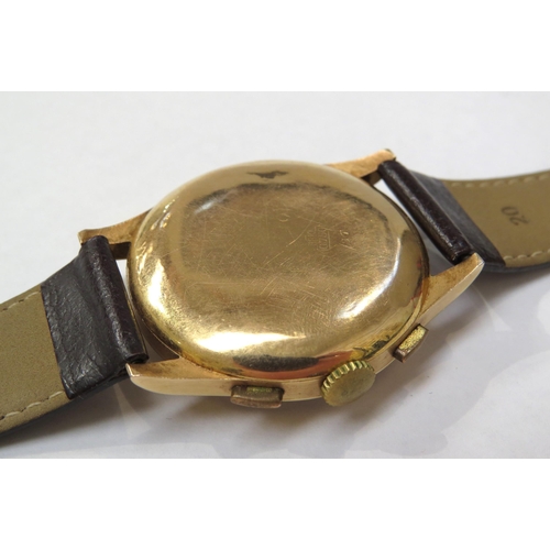 8162 - An 18ct gold cased chronograph wristwatch on leather strap, the gold coloured dial with Arabic numer... 