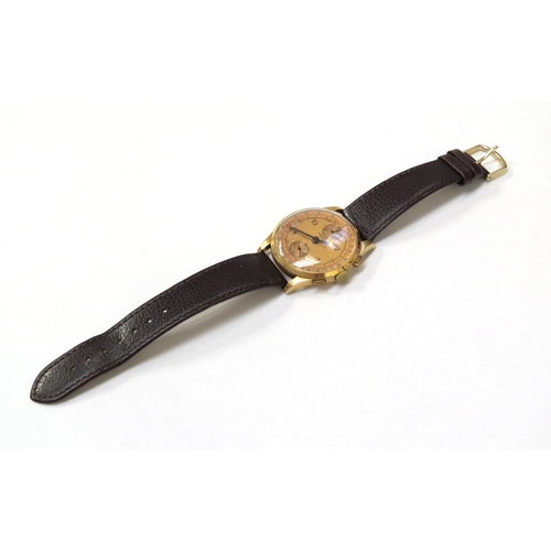 8162 - An 18ct gold cased chronograph wristwatch on leather strap, the gold coloured dial with Arabic numer... 