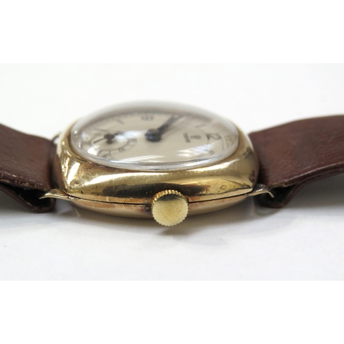 8158 - TUDOR: A 9ct gold cushion cased Tudor wristwatch on a leather strap, the silvered dial with Arabic n... 