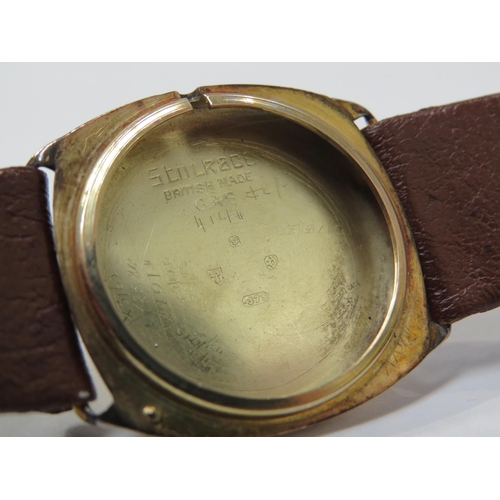 8158 - TUDOR: A 9ct gold cushion cased Tudor wristwatch on a leather strap, the silvered dial with Arabic n... 