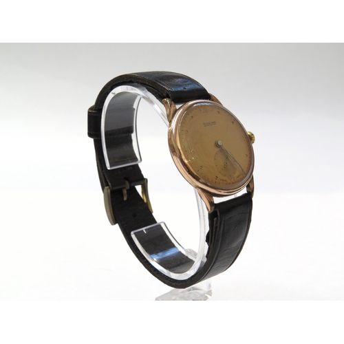 8154 - A Silvana stainless steel back wristwatch on leather strap, the gilt and steel case with semi Roman ... 