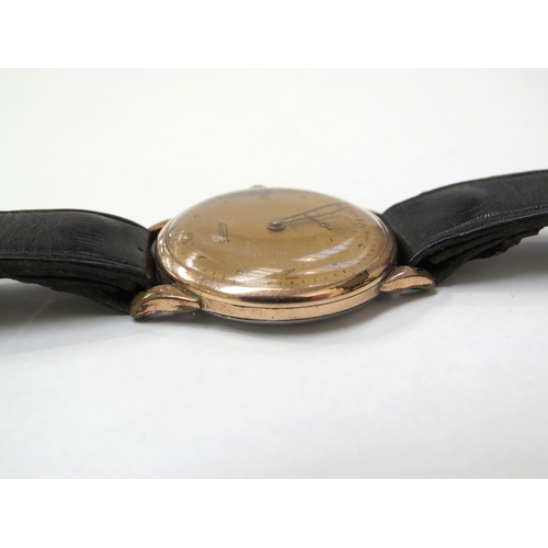 8154 - A Silvana stainless steel back wristwatch on leather strap, the gilt and steel case with semi Roman ... 