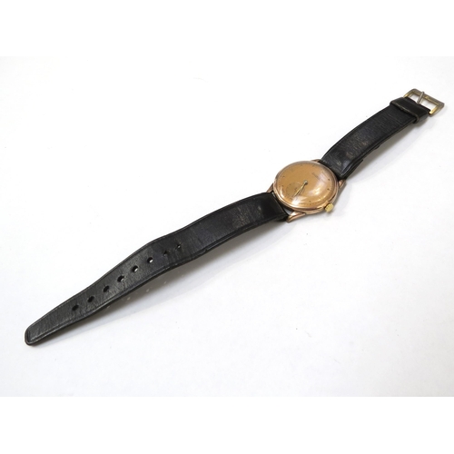 8154 - A Silvana stainless steel back wristwatch on leather strap, the gilt and steel case with semi Roman ... 