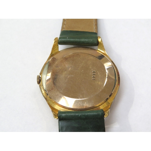 8155 - An Olma Divinal Luxe gentleman's wristwatch on a green leather strap, the textured dial with gilt Ar... 