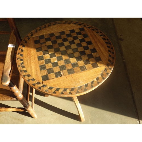 2010 - A Regency circular oak parquetry games table