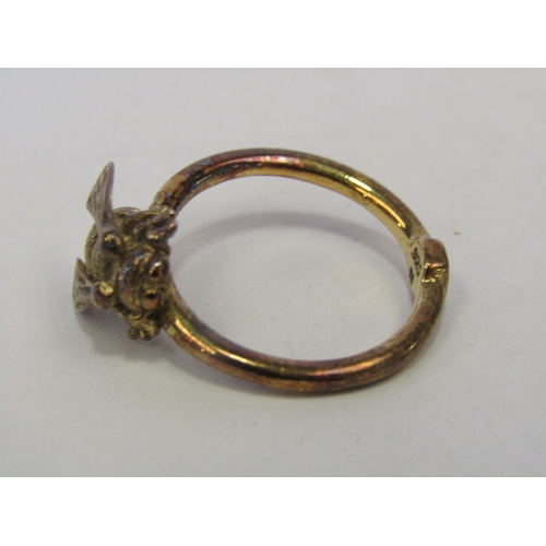 1308 - A silver bangle, padlock clasp marked silver, two lockets, 