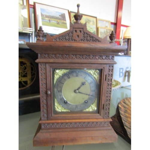 1522 - A faux slate mantel clock (a/f) together with an oak example and wall hanging example (3)