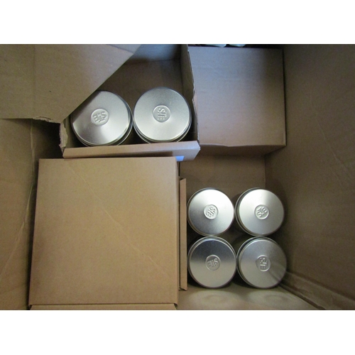 1542 - A box of various scented tin candles