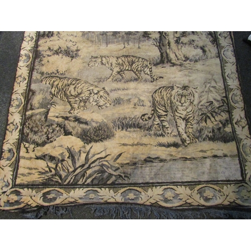 1040 - A mid-20th Century velour wall hanging with fringing, depicting naturalistic scene with roaming towe... 