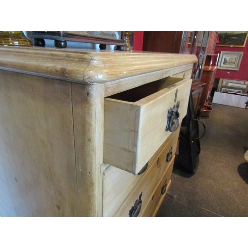 1097 - A pine chest of two short over three long drawers, Art Nouveau handles, 107cm tall x 93cm wide x 50c... 