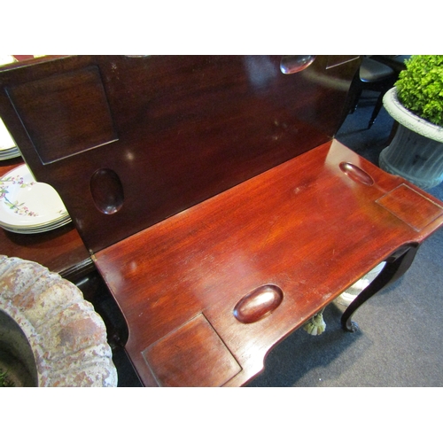 1100 - A Georgian fold-out card table with single drawer on sabre legs to paw feet