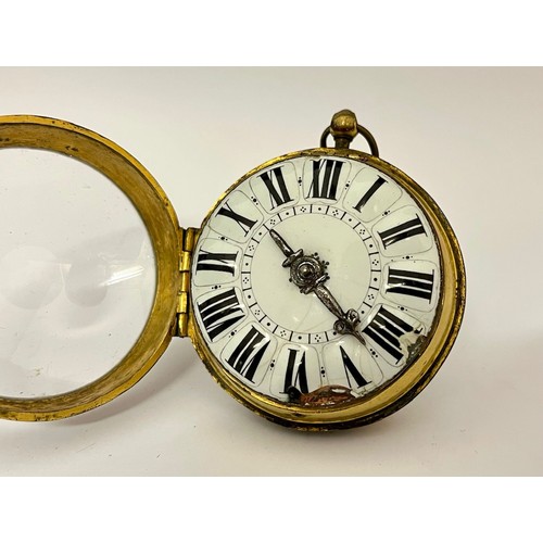 5219 - ANDRE HORY A PARIS: An early 18th Century French oignon pocket watch, double hinged gilt metal case.... 