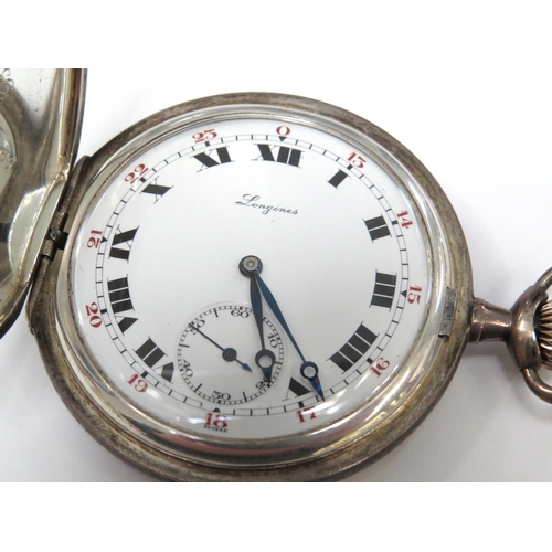 8123 - LONGINES: An early 20th Century full hunter pocket watch, case with geometric design, military prese... 