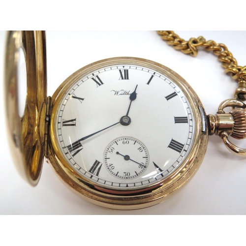 8128 - A gold plated half hunter pocket watch on chain with silver Albert, movement signed American Waltham... 