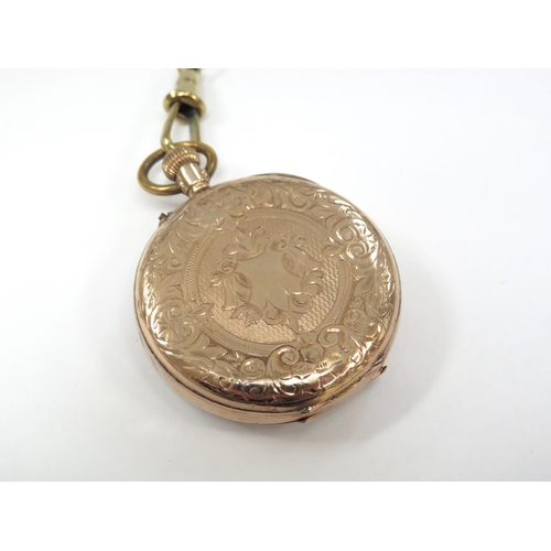 8136 - A small 9ct gold cased pocket watch, Roman numeral dial with engraved back plate, with chain and T-b... 