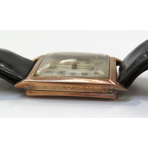 8145 - An Art Deco 9ct rose gold cased wristwatch, worn rectangular form Arabic numeral dial, with subsidia... 