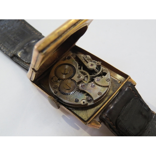 8145 - An Art Deco 9ct rose gold cased wristwatch, worn rectangular form Arabic numeral dial, with subsidia... 