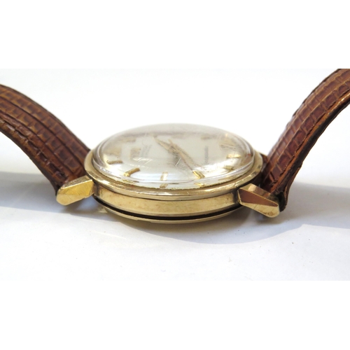 8149 - OMEGA: A 9ct gold cased Omega Seamaster Automatic wristwatch on reptile leather strap, with Omega bu... 