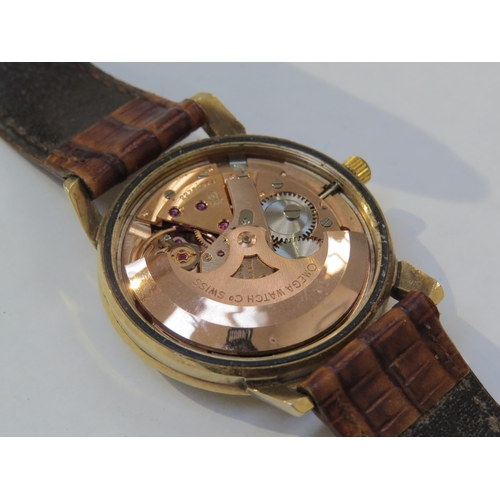 8149 - OMEGA: A 9ct gold cased Omega Seamaster Automatic wristwatch on reptile leather strap, with Omega bu... 