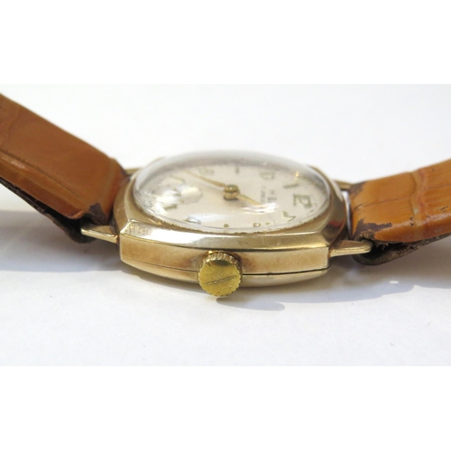 8146 - A 9ct gold cased H & G wristwatch on leather strap, Arabic numeral and baton marker dial with subsid... 