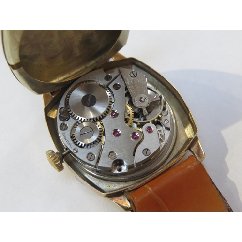 8146 - A 9ct gold cased H & G wristwatch on leather strap, Arabic numeral and baton marker dial with subsid... 