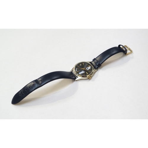 8176 - A Smiths Empire black dial gentleman's wristwatch, blue engine turned dial with gilt arrow markers i... 